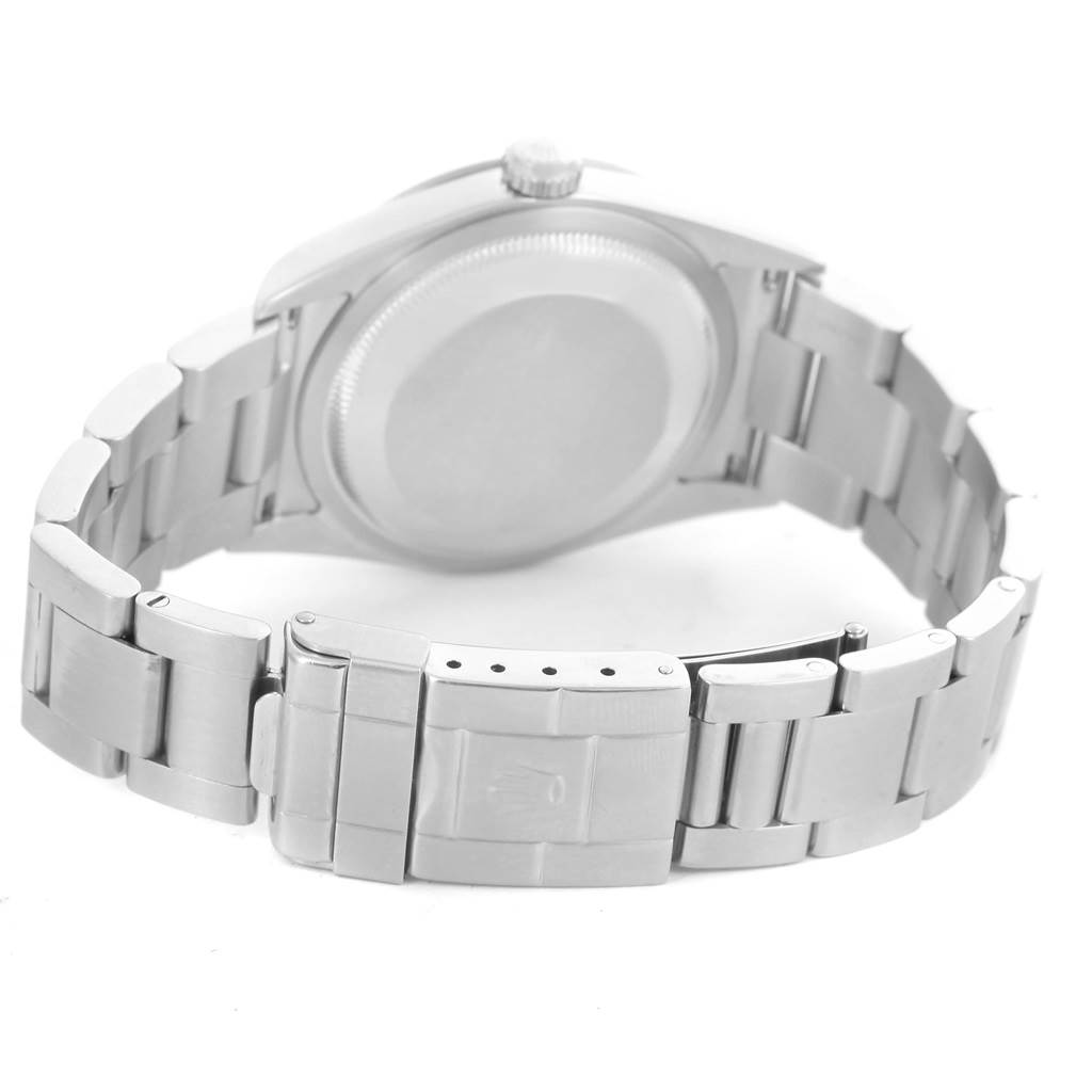 This image displays the backside and bracelet of a Rolex Explorer 114270 Men's Stainless Steel Black Dial 114270 Men's Stainless Steel Black Dial watch, showcasing the clasp and case back.