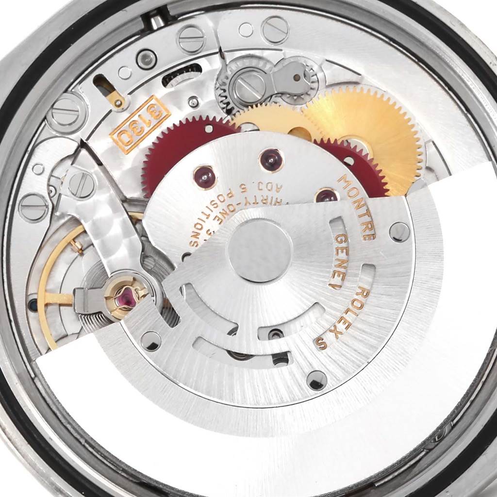 This image shows a close-up of the movement and internal components of a Rolex Explorer 114270 Men's Stainless Steel Black Dial 114270 Men's Stainless Steel Black Dial watch.