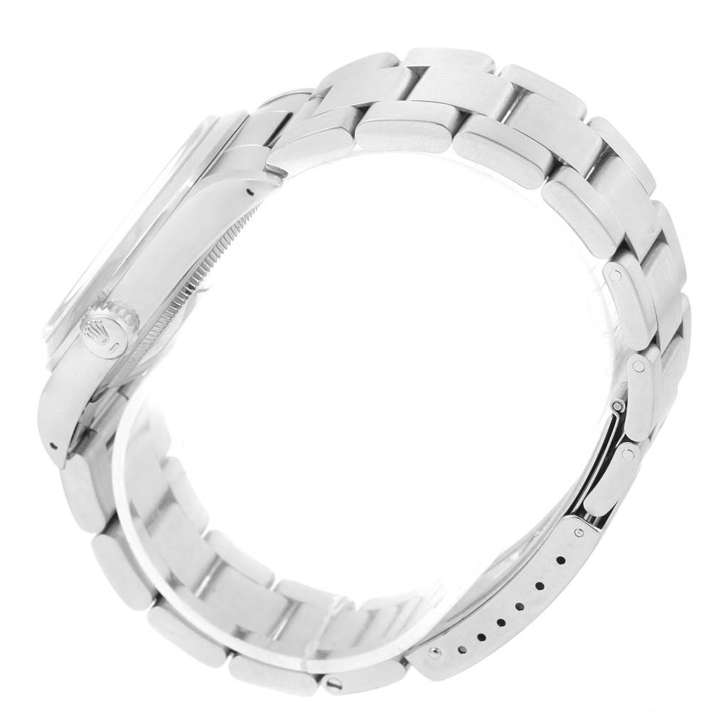 The image shows a side view of a Rolex Explorer 14270 Men
s Stainless Steel Black Dial 14270 Men
s Stainless Steel Black Dial model, focusing on the bracelet, clasp, and the watch crown.