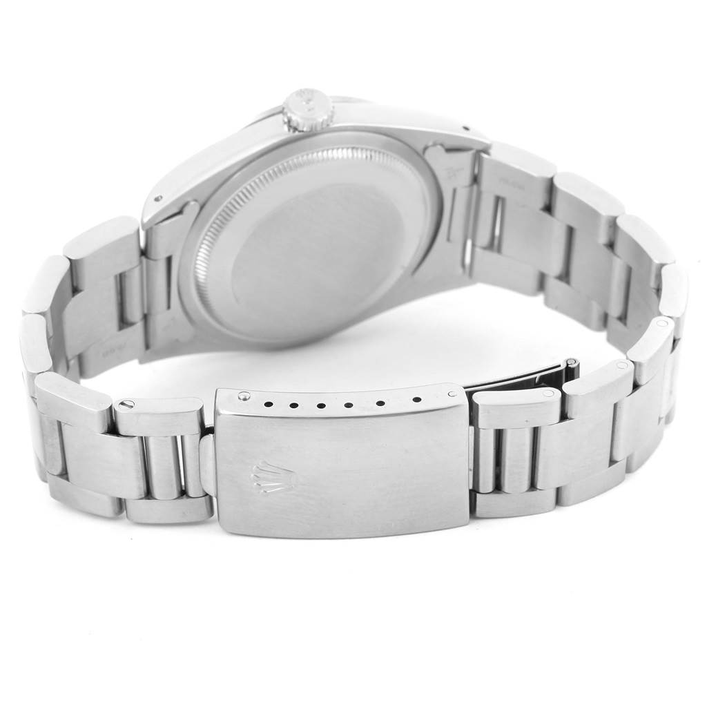 The image shows the back of the Rolex Explorer 14270 Men
s Stainless Steel Black Dial 14270 Men
s Stainless Steel Black Dial watch, highlighting its bracelet, clasp, and case back.