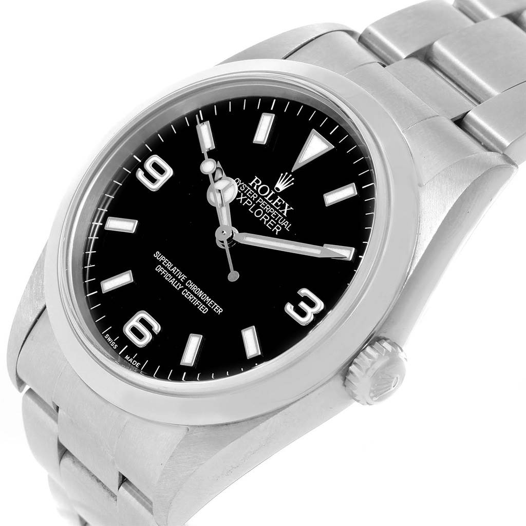 The image showcases a close-up, angled view of the Rolex Explorer 14270 Men
s Stainless Steel Black Dial 14270 Men
s Stainless Steel Black Dial watch, showing its dial, bezel, crown, and part of the band.