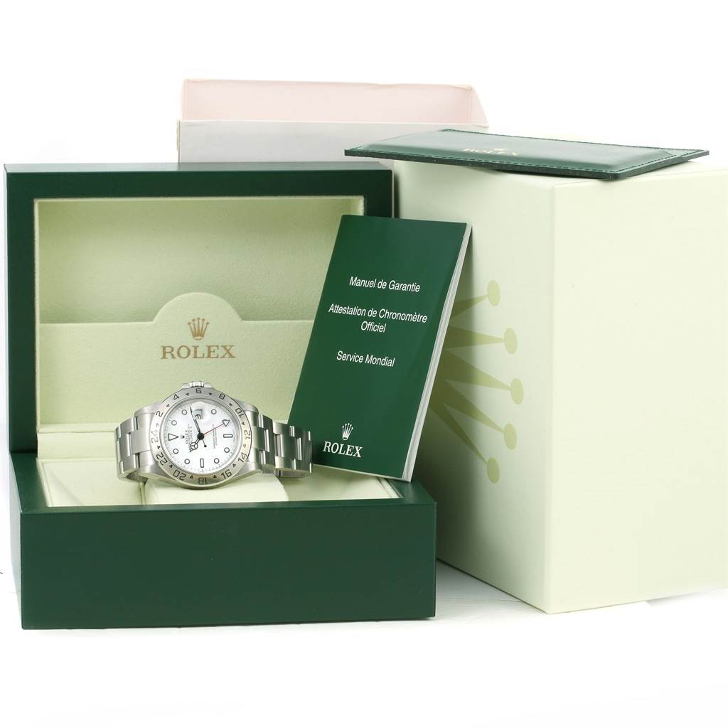 The image shows a Rolex Explorer 16570 Men's Stainless Steel White Dial 16570 Men's Stainless Steel White Dial model watch in its box with accompanying documents, all viewed from a front angle.