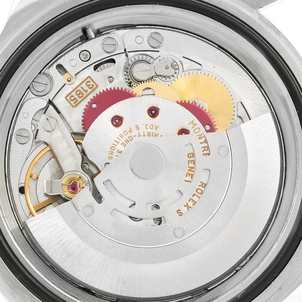 This image shows the internal mechanism of a Rolex Explorer 16570 Men's Stainless Steel White Dial 16570 Men's Stainless Steel White Dial watch, viewed from the back with detailed gears and components visible.