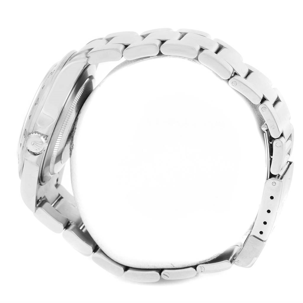 The image shows the side view of a Rolex Explorer 16570 Men's Stainless Steel White Dial 16570 Men's Stainless Steel White Dial watch, highlighting the bracelet, bezel, and crown.