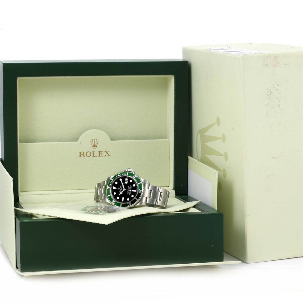 The Rolex Explorer 16610LV Men's Stainless Steel Black Dial 16610LV Men's Stainless Steel Black Dial watch is shown inside its open box, resting on a cloth, with its outer packaging visible.