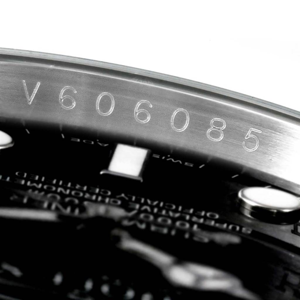 This close-up image shows the serial number on the inner bezel of the Rolex Explorer 16610LV Men's Stainless Steel Black Dial 16610LV Men's Stainless Steel Black Dial watch.