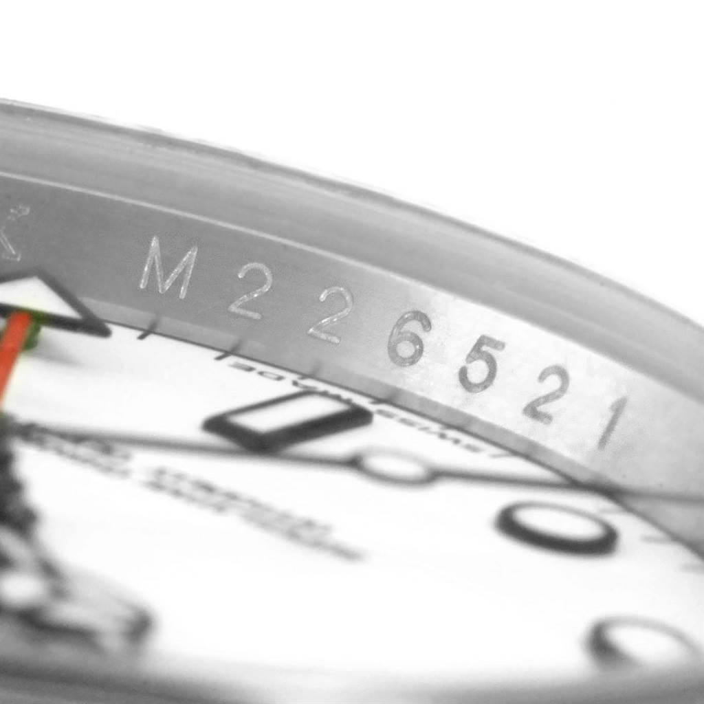 The image shows a close-up angle of the Rolex Explorer 16570 Men's Stainless Steel White Dial 16570 Men's Stainless Steel White Dial watch, specifically the dial and part of the bezel with numerals.