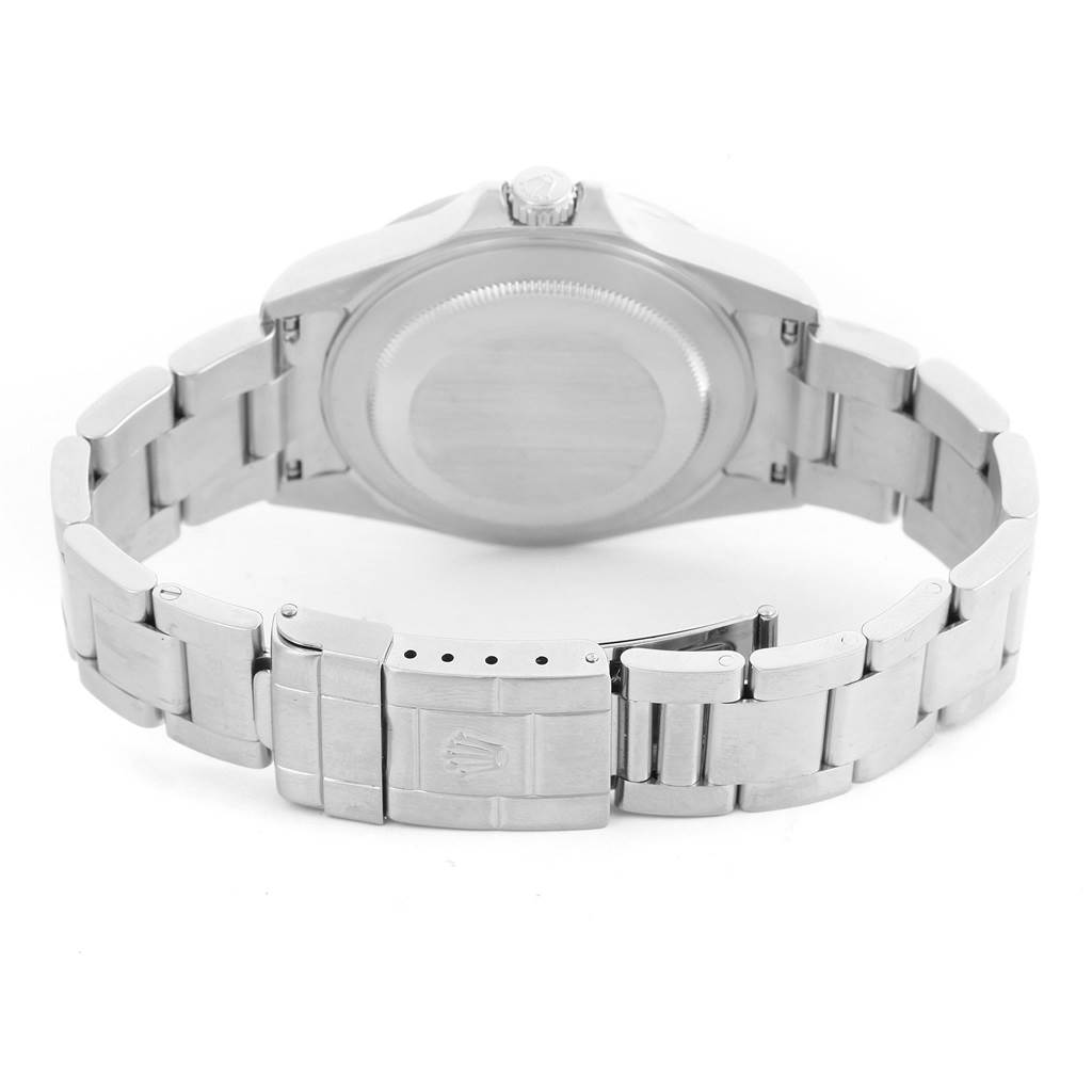 This is a rear angle view of a Rolex Explorer 16570 Men's Stainless Steel White Dial 16570 Men's Stainless Steel White Dial watch, showing the case back and metal bracelet clasp.