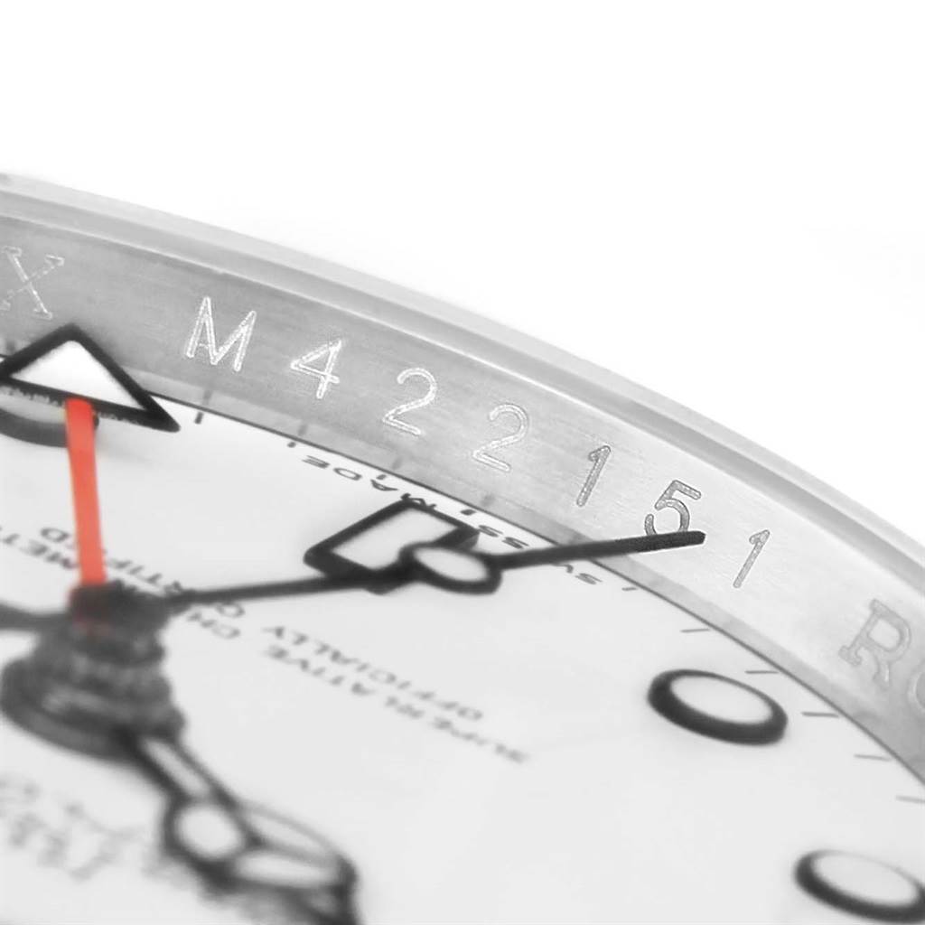 The image shows a close-up of the dial, bezel, and serial number engraving on a Rolex Explorer 16570 Men's Stainless Steel White Dial 16570 Men's Stainless Steel White Dial watch.