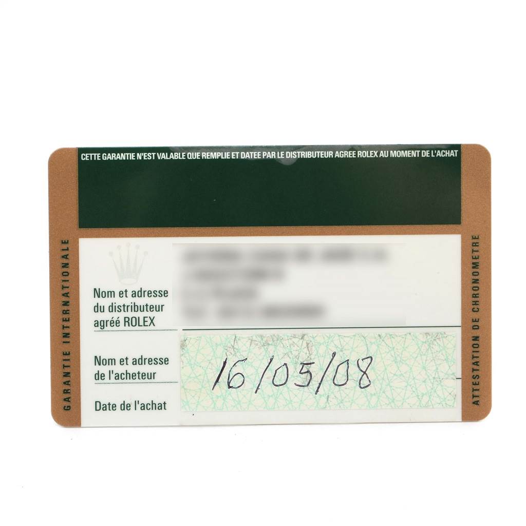 This image shows the international guarantee card for the Rolex Explorer 16570 Men's Stainless Steel Black Dial 16570 Men's Stainless Steel Black Dial model, displaying the purchase date and dealer details.