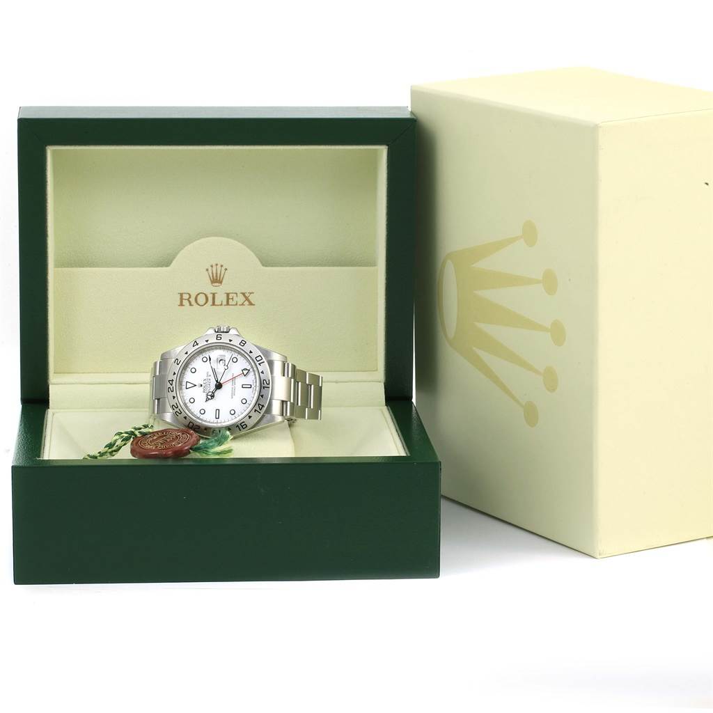 The Rolex Explorer 16570 Men's Stainless Steel White Dial 16570 Men's Stainless Steel White Dial watch is shown front-facing inside its green and cream box with the brand logo.