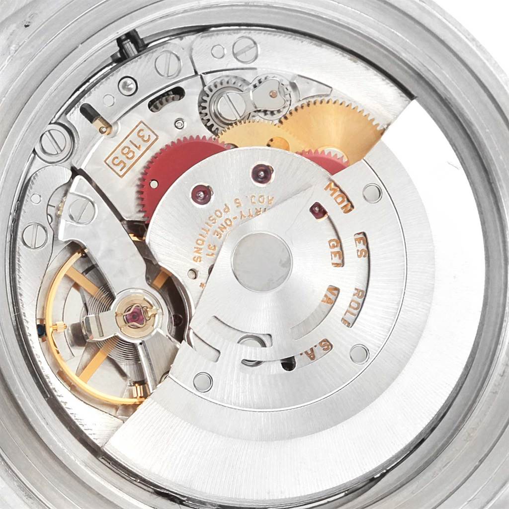 The image shows a close-up of the movement mechanism inside a Rolex Explorer 16570 Men
s Stainless Steel White Dial 16570 Men
s Stainless Steel White Dial watch.