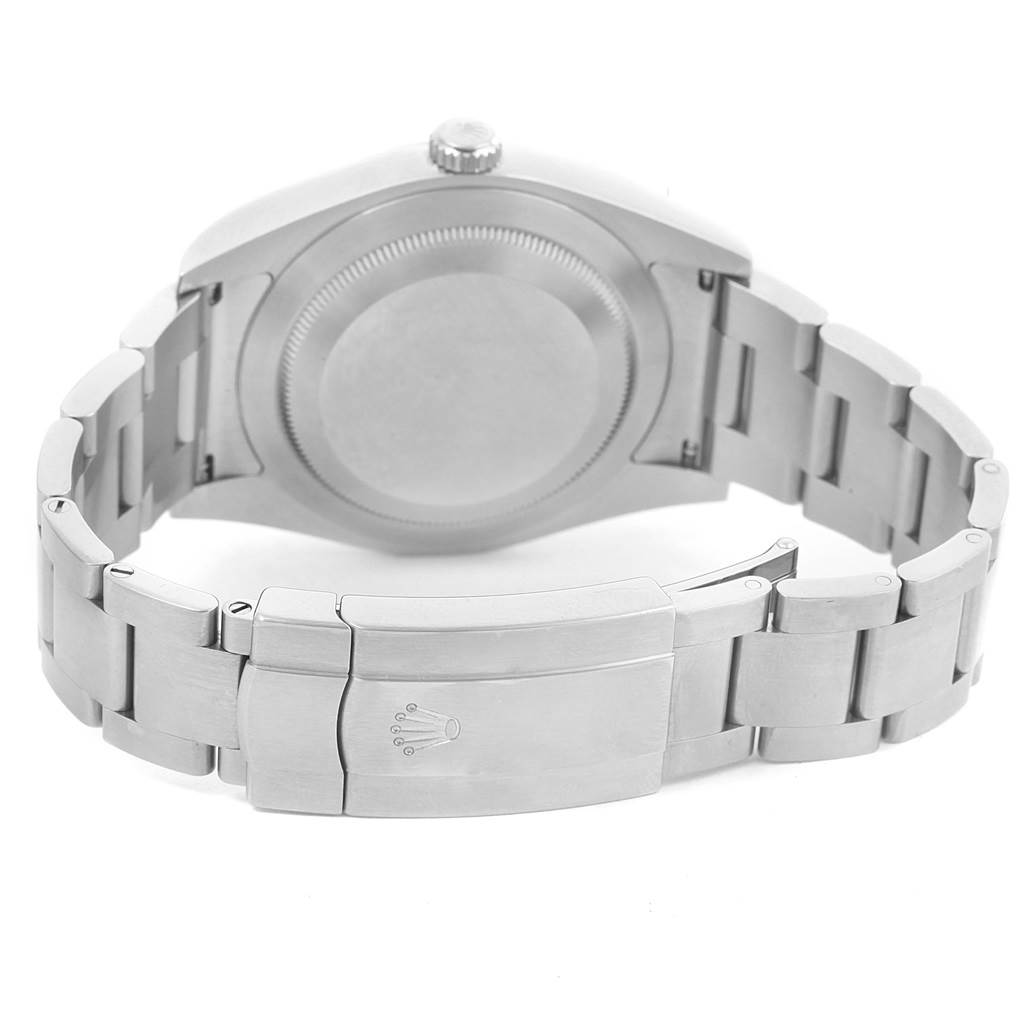 The image shows the backside and clasp of a Rolex Explorer 114300 Men's Stainless Steel Blue Dial 114300 Men's Stainless Steel Blue Dial watch, focusing on the stainless steel bracelet and closed case back.