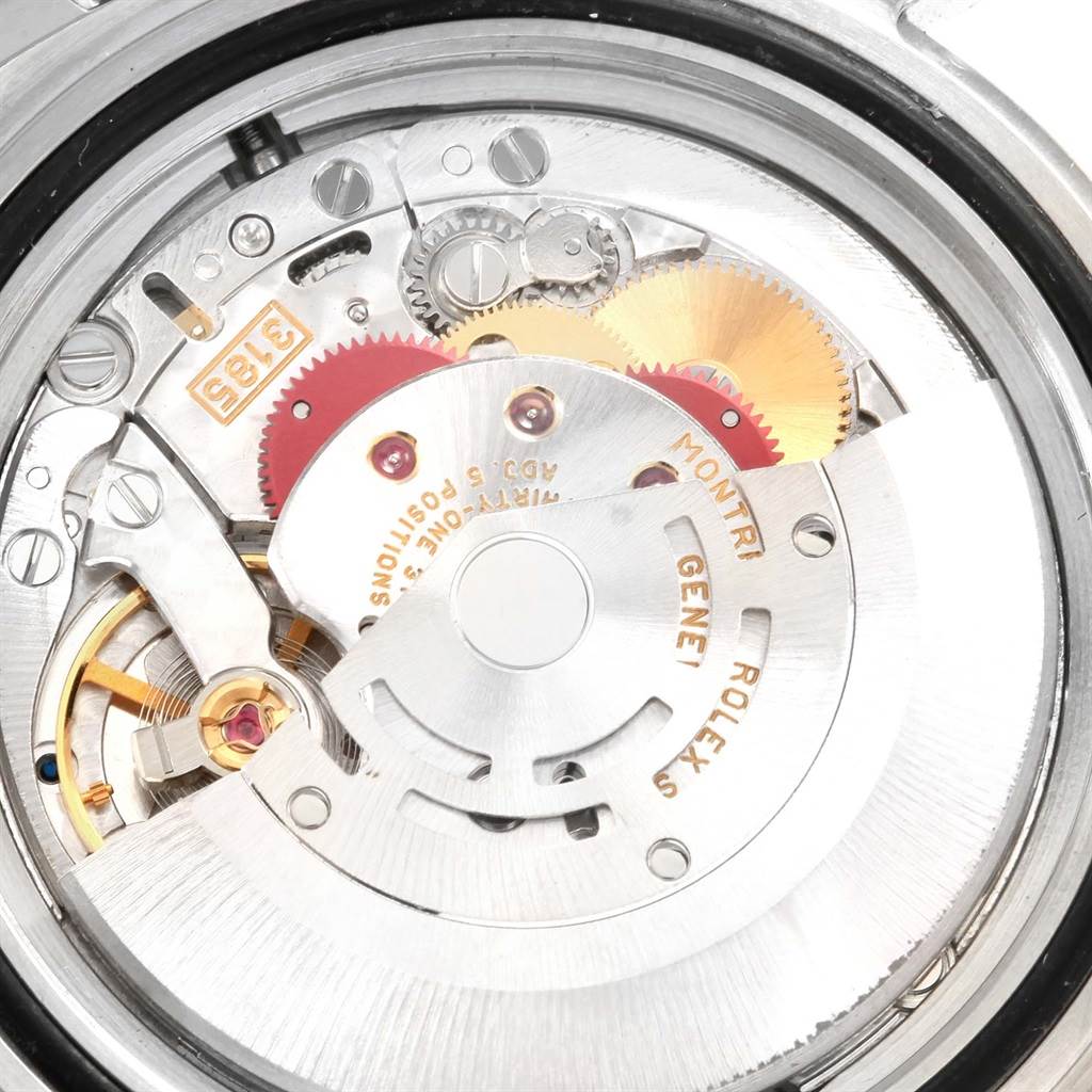 This image shows a close-up of the movement mechanism inside a Rolex Explorer 16570 Men's Stainless Steel Black Dial 16570 Men's Stainless Steel Black Dial watch.