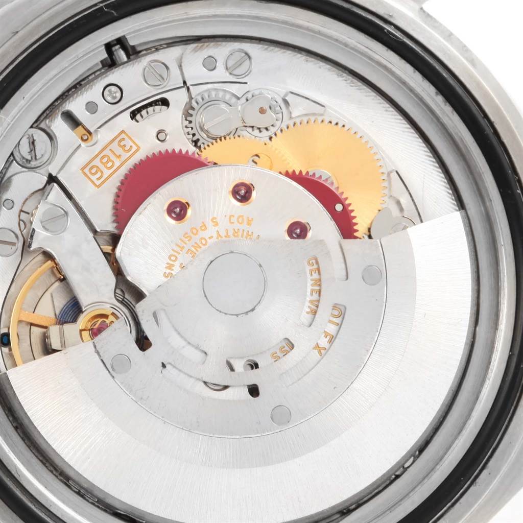 This close-up shot of the Rolex Explorer 16570 Men's Stainless Steel Black Dial 16570 Men's Stainless Steel Black Dial shows the intricate details of its internal mechanical movement.