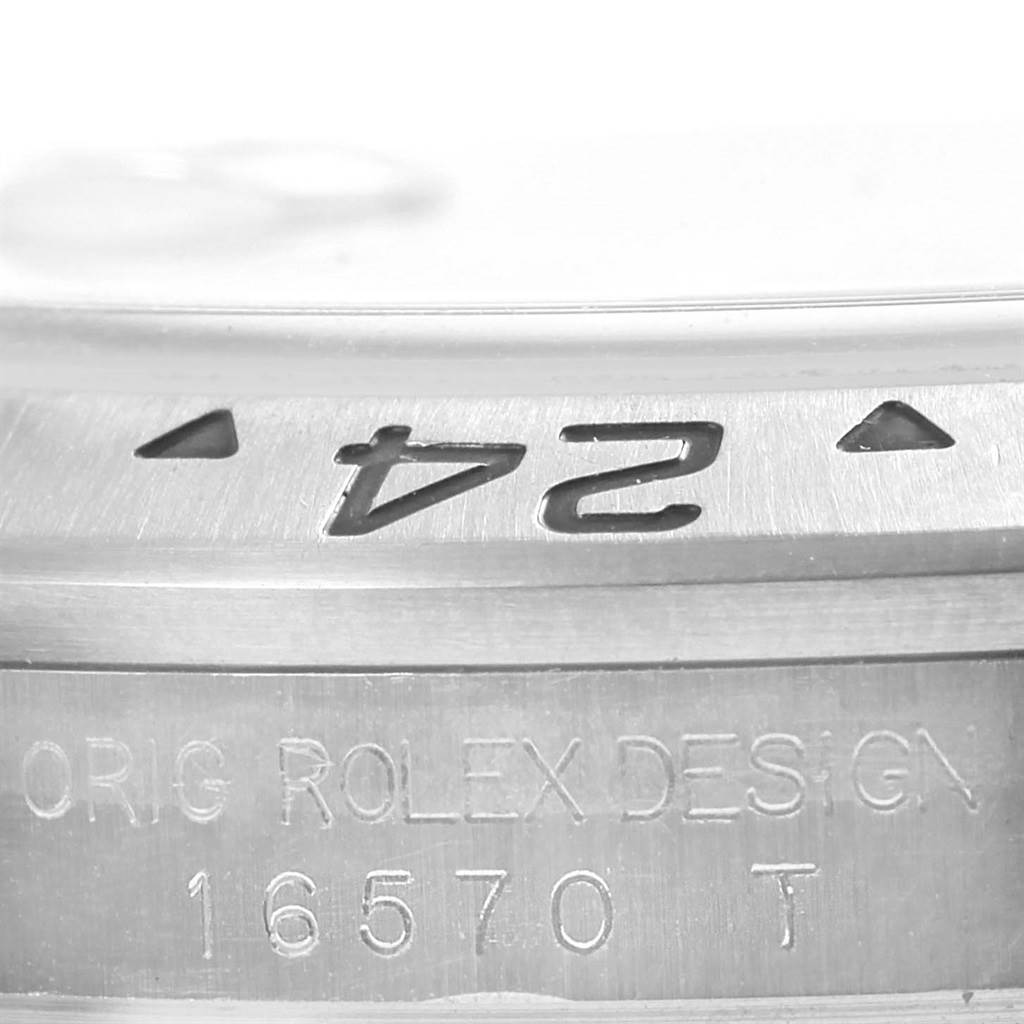 This image shows a close-up of the bezel and side engraving of the Rolex Explorer 16570 Men's Stainless Steel Black Dial 16570 Men's Stainless Steel Black Dial, model number 16570.
