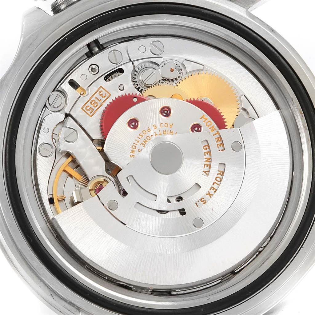 This image shows the internal machinery and intricate components of a Rolex Explorer 16570 Men's Stainless Steel White Dial 16570 Men's Stainless Steel White Dial watch from a top-down angle.