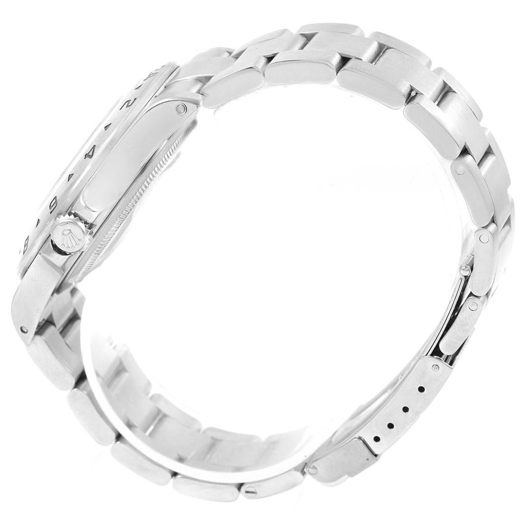 This image shows a side angle of the Rolex Explorer 16570 Men's Stainless Steel White Dial 16570 Men's Stainless Steel White Dial watch, highlighting the stainless steel bracelet and part of the watch face.