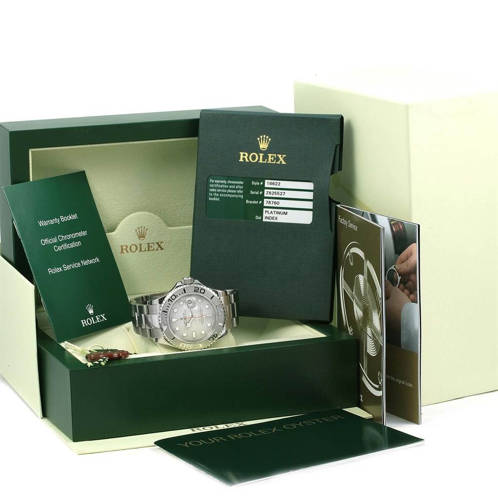 This image shows a Rolex Explorer 16622 Men's Stainless Steel Silver Dial 16622 Men's Stainless Steel Silver Dial watch and accessories, including booklets and the original packaging, viewed from a frontal angle.