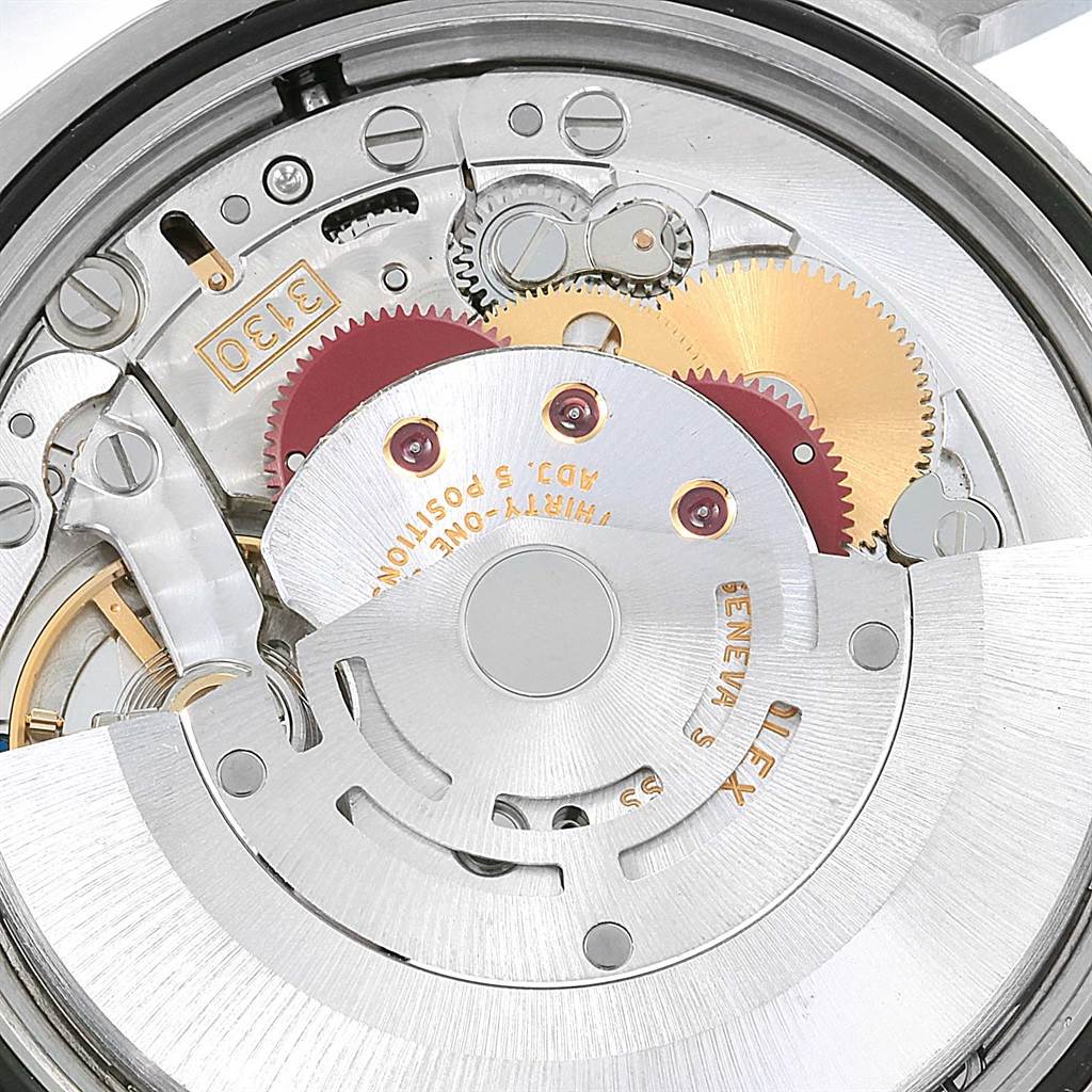 The image shows a close-up view of the movement mechanism of a Rolex Explorer 114270 Men's Stainless Steel Black Dial 114270 Men's Stainless Steel Black Dial watch.