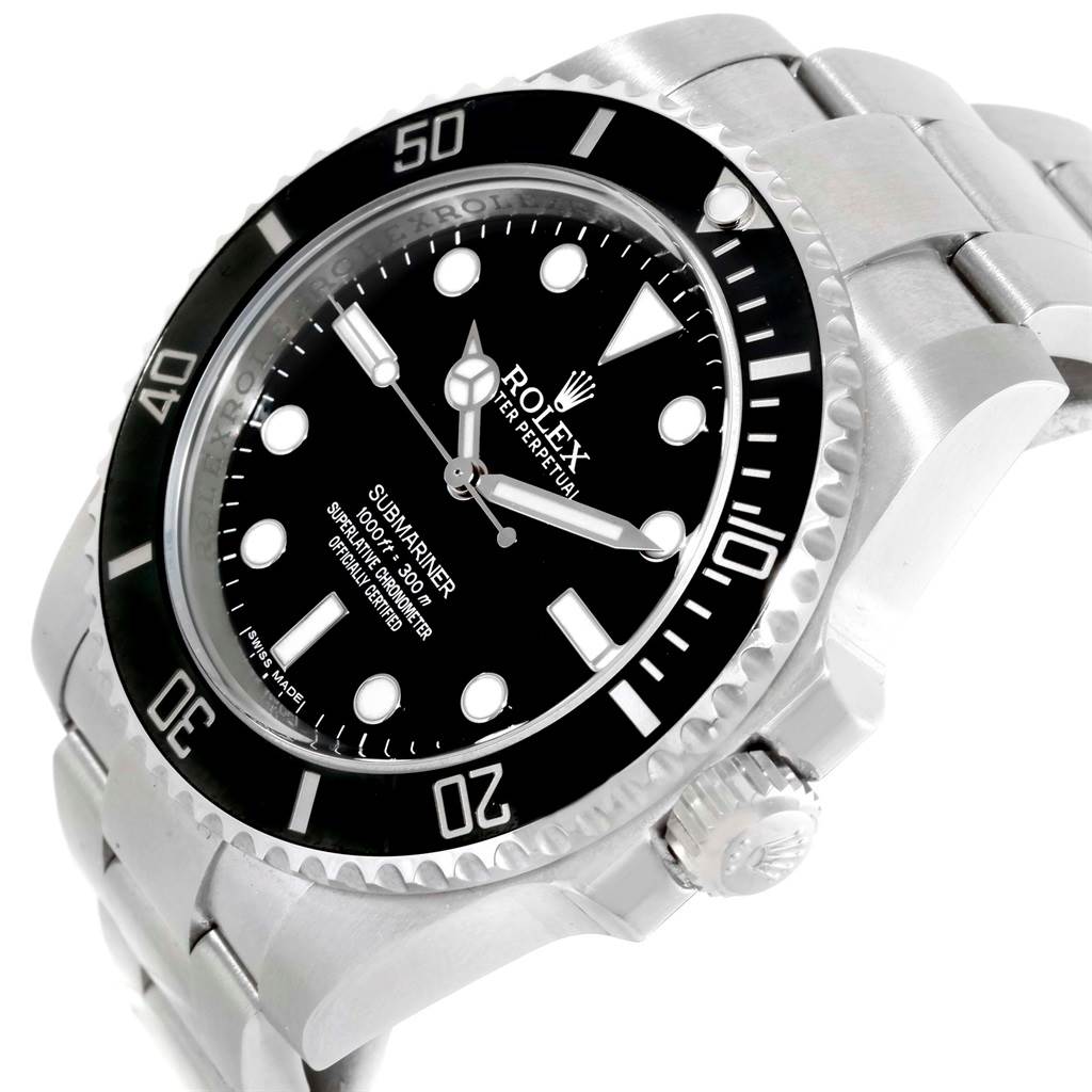 This image shows a close-up angle of the Rolex Submariner, featuring the dial, bezel, and part of the bracelet.