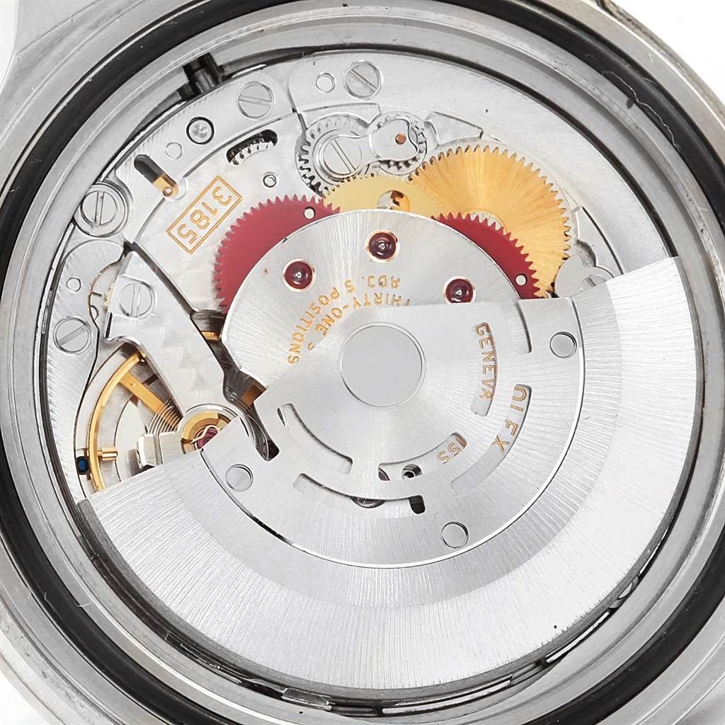 This image shows a close-up of the Rolex Explorer 16570 Men's Stainless Steel Black Dial 16570 Men's Stainless Steel Black Dial watch movement, highlighting gears and internal mechanisms.