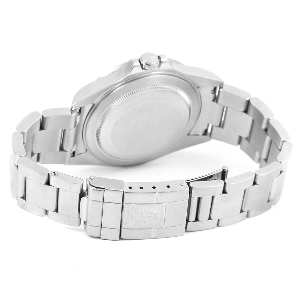 The image shows the back view of a Rolex Explorer 16570 Men's Stainless Steel Black Dial 16570 Men's Stainless Steel Black Dial model, featuring the case back, crown, and bracelet with the clasp visible.