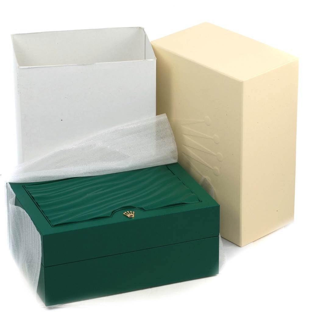 The image shows the packaging boxes for a Rolex Explorer 216570 Men's Stainless Steel White Dial 216570 Men's Stainless Steel White Dial watch, including the green inner box, white outer box, and beige protective cover.