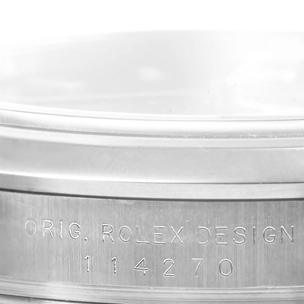 This image shows a close-up view of the case with the serial number engraving of the Rolex Explorer 114270 Men's Stainless Steel Black Dial 114270 Men's Stainless Steel Black Dial model.