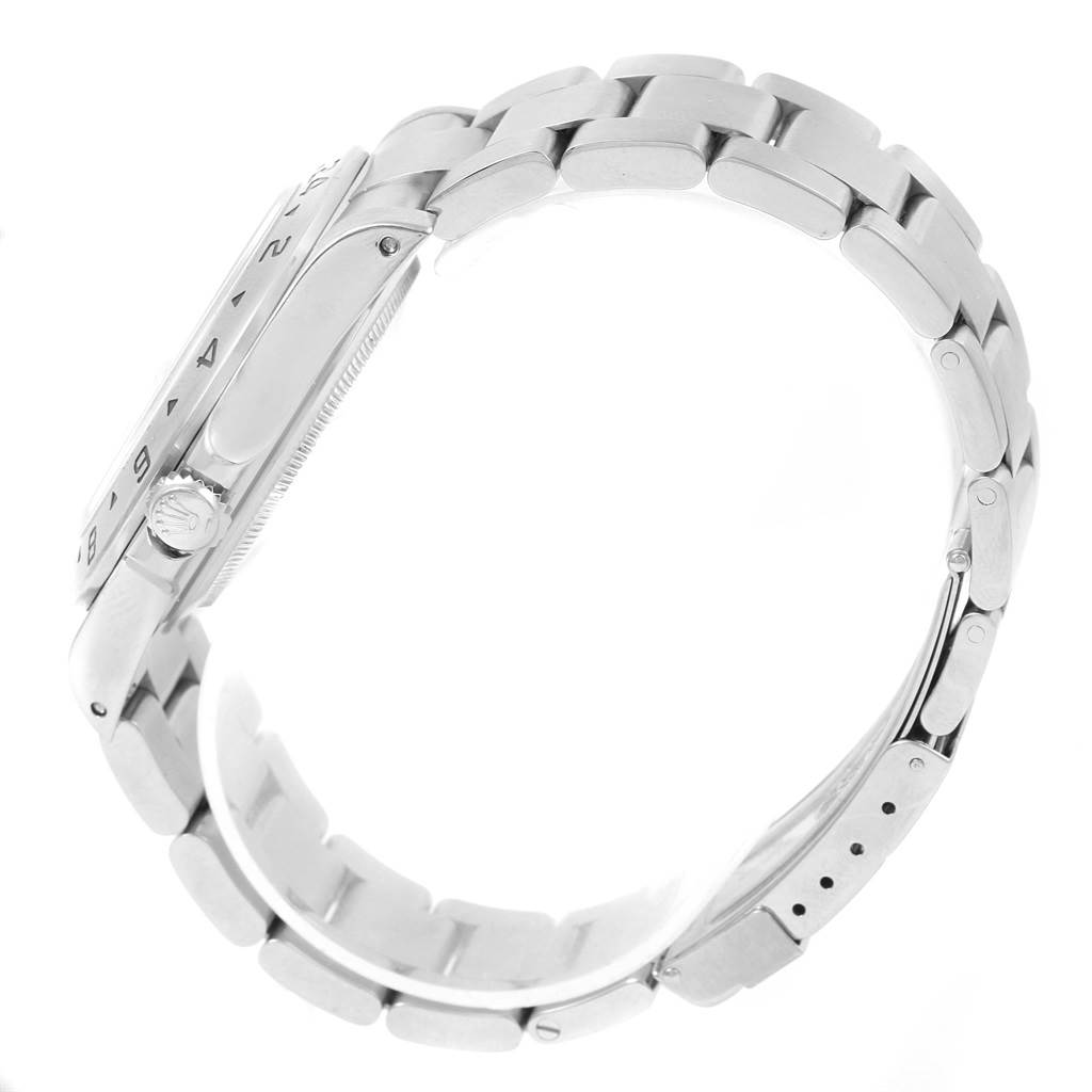 The Rolex Explorer 16570 Men's Stainless Steel Black Dial 16570 Men's Stainless Steel Black Dial watch is shown from a side angle, displaying its bezel, crown, and bracelet.