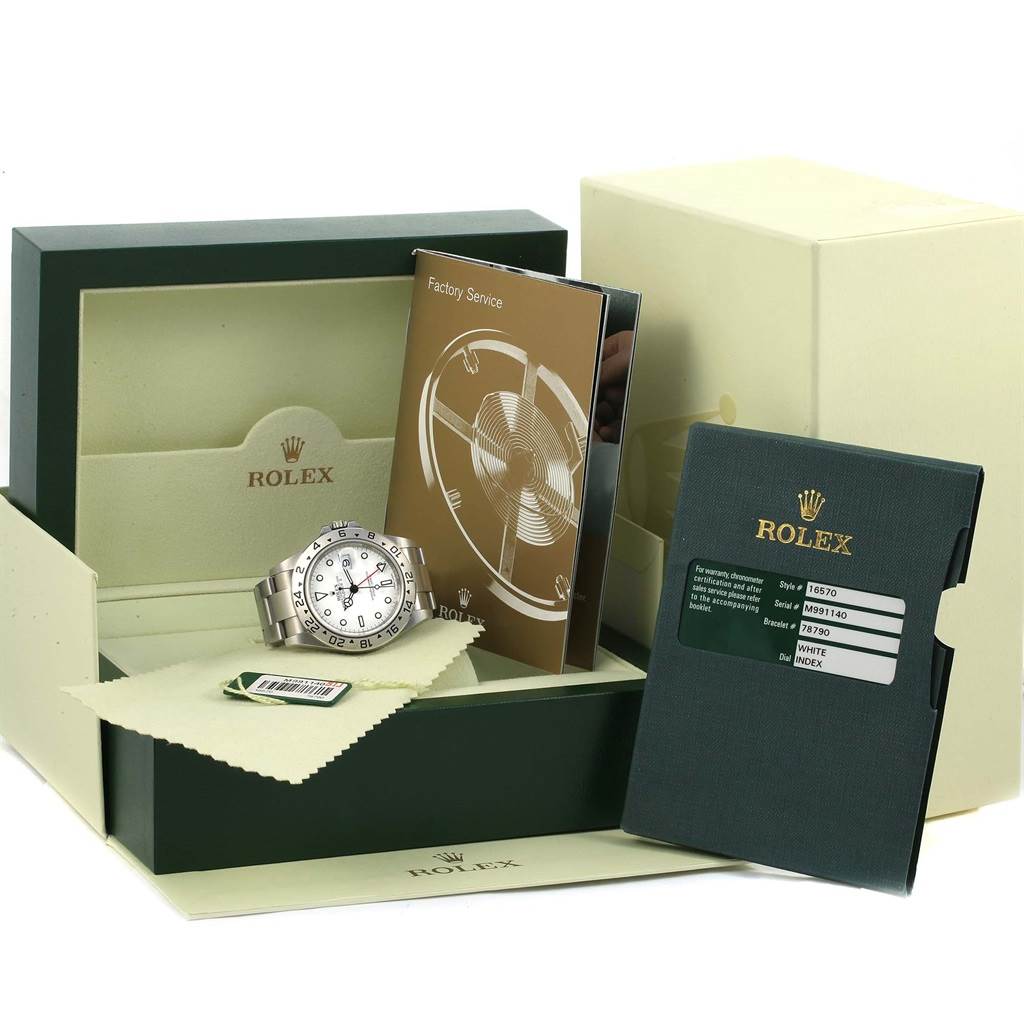 The image displays a Rolex Explorer 16570 Men's Stainless Steel White Dial 16570 Men's Stainless Steel White Dial watch with its box, booklets, and tags from a frontal angle.