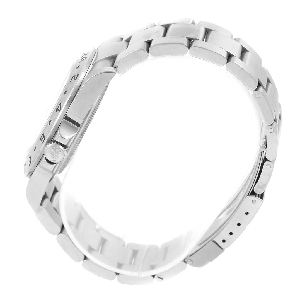 The image shows the side view of a Rolex Explorer 16570 Men's Stainless Steel White Dial 16570 Men's Stainless Steel White Dial watch focusing on the bracelet, case, and crown.