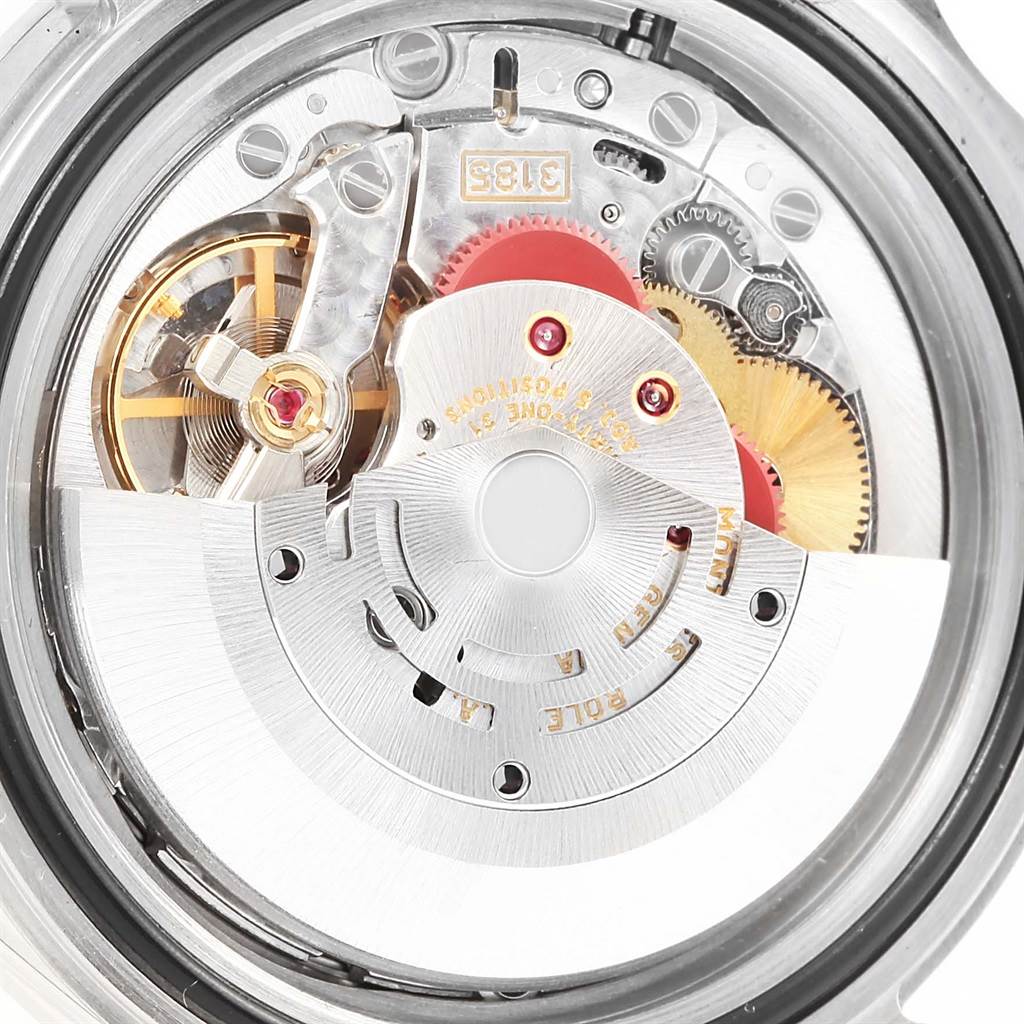 This image shows a close-up of the intricate inner mechanics of a Rolex Explorer 16570 Men's Stainless Steel White Dial 16570 Men's Stainless Steel White Dial model watch.