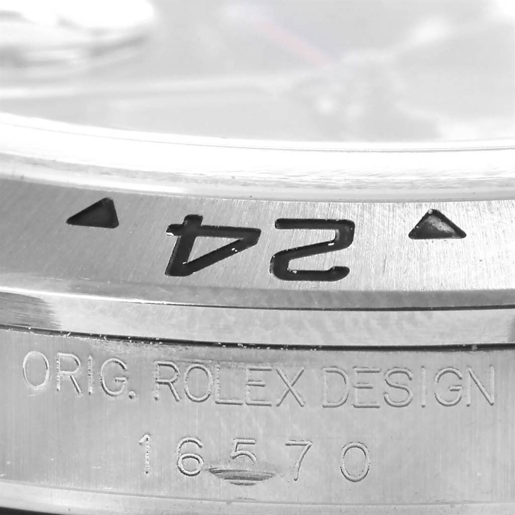 This close-up angle shows the bezel and case side of the Rolex Explorer 16570 Men's Stainless Steel Black Dial 16570 Men's Stainless Steel Black Dial model, highlighting the engravings and markings.