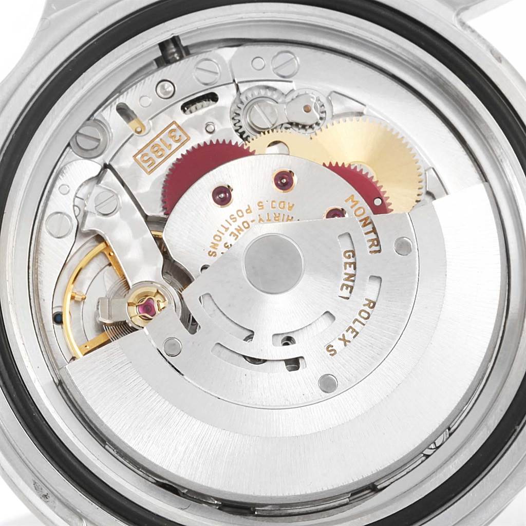 This image shows a close-up view of the movement of a Rolex Explorer 16570 Men's Stainless Steel White Dial 16570 Men's Stainless Steel White Dial watch, highlighting its intricate internal mechanisms.