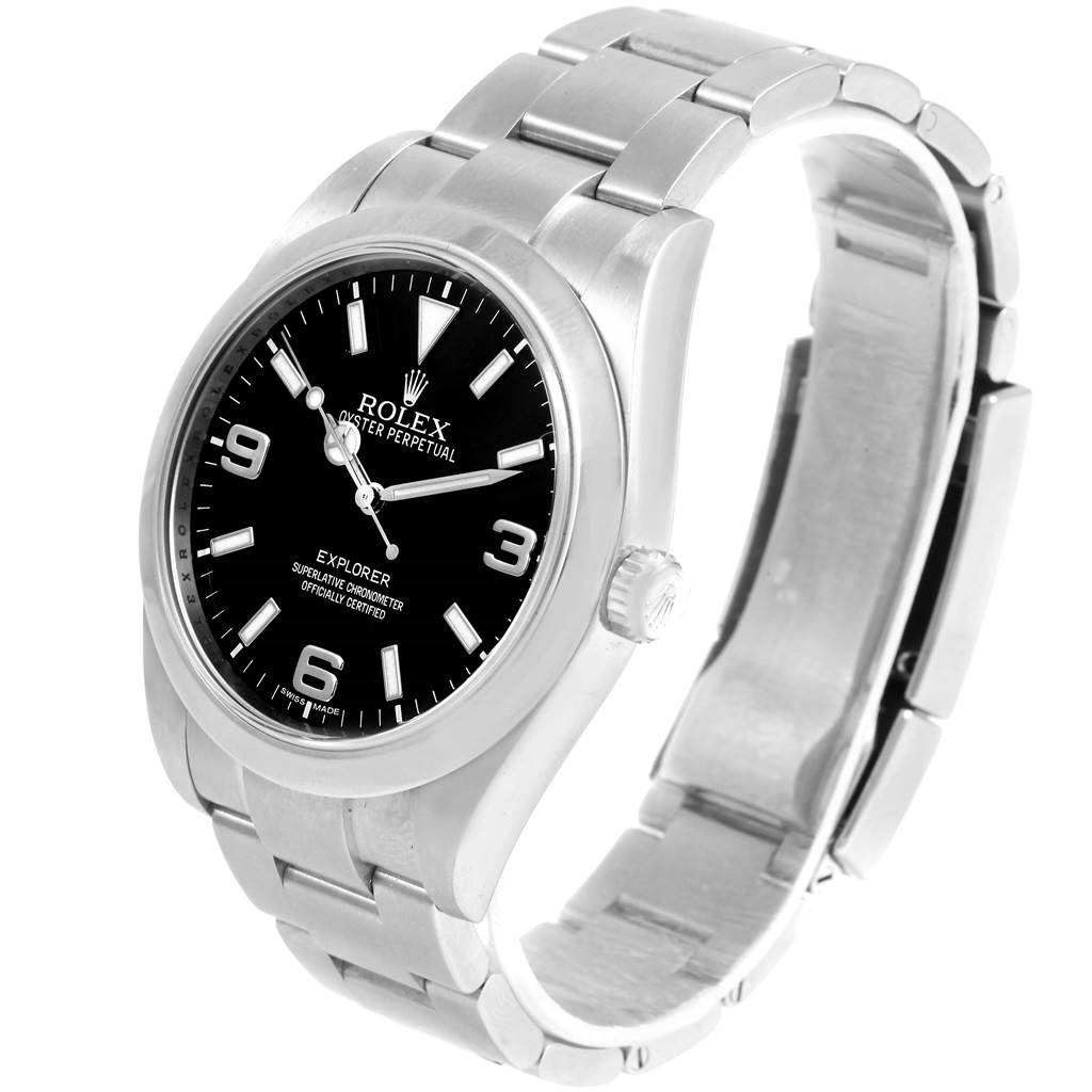 The image shows an angled view of the Rolex Explorer 214270 Men's Stainless Steel Black Dial 214270 Men's Stainless Steel Black Dial watch, highlighting the dial, crown, and partially open bracelet.