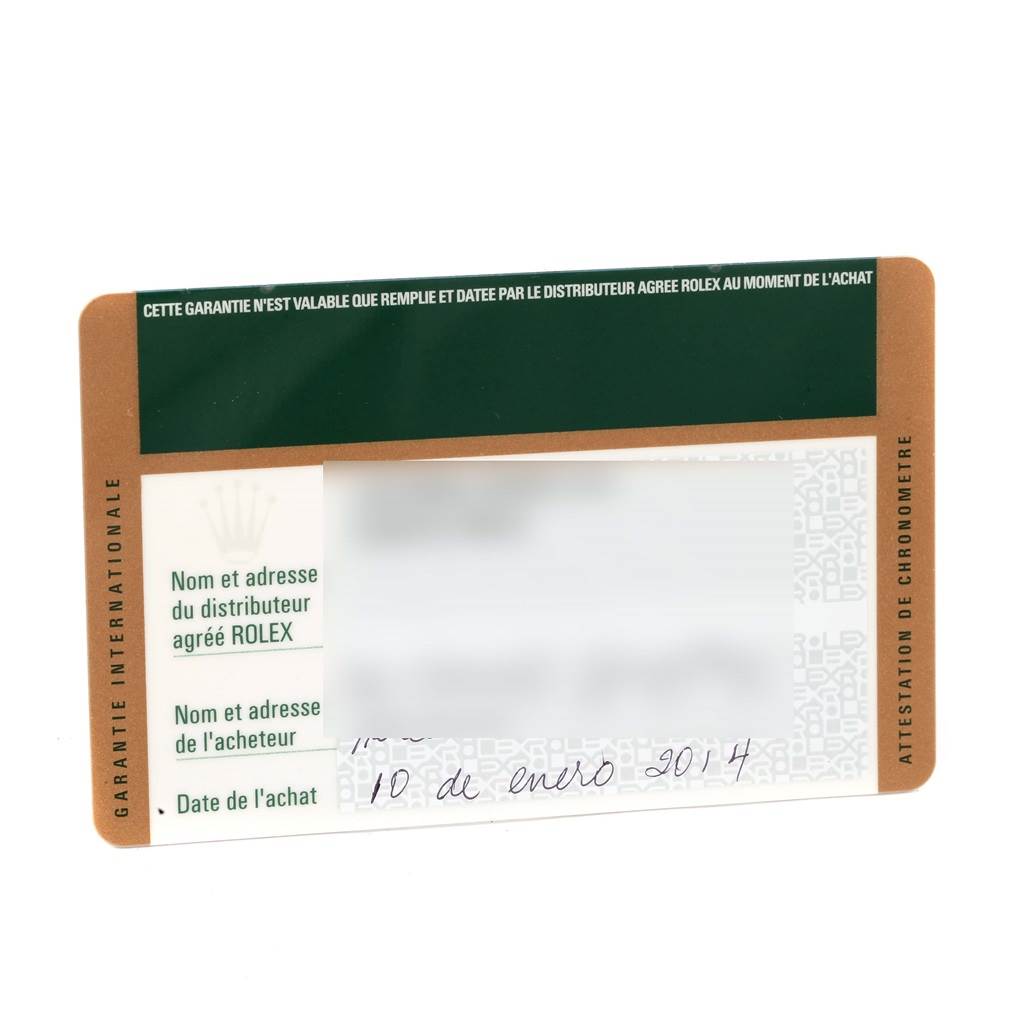 This image shows the international warranty card for the Rolex Explorer 214270 Men's Stainless Steel Black Dial 214270 Men's Stainless Steel Black Dial model, with details partially obscured.