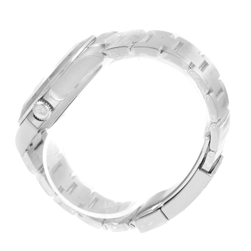 The image shows a top-down view of a Rolex Explorer 216570 Men's Stainless Steel Black Dial 216570 Men's Stainless Steel Black Dial watch focusing on the case, crown, and bracelet.