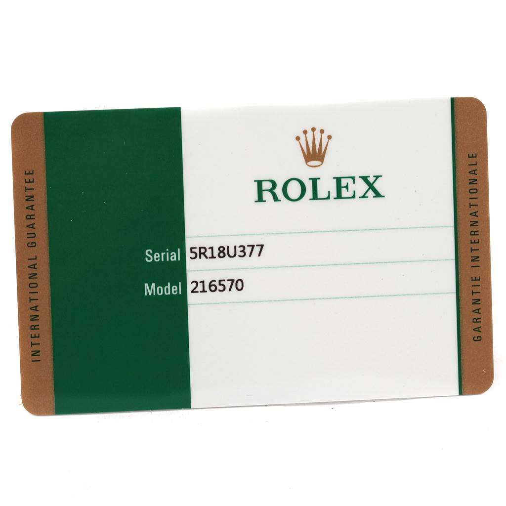 The image shows the warranty card for a Rolex Explorer 216570 Men's Stainless Steel Black Dial 216570 Men's Stainless Steel Black Dial model 216570 with a visible serial number.