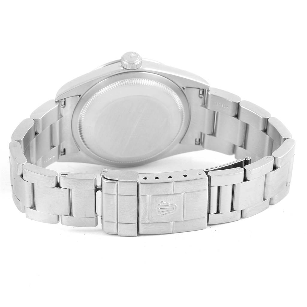 The image shows the back view of a Rolex Explorer 14270 Men's Stainless Steel Black Dial 14270 Men's Stainless Steel Black Dial watch, highlighting its case back, bracelet, and clasp.