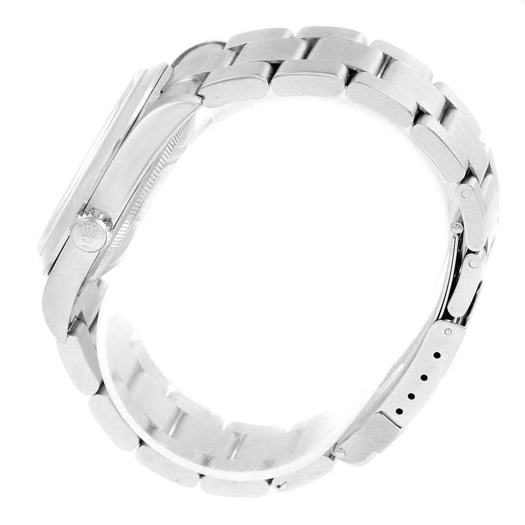 The image shows the side view of a Rolex Explorer 14270 Men's Stainless Steel Black Dial 14270 Men's Stainless Steel Black Dial watch, highlighting the crown, case, and bracelet.