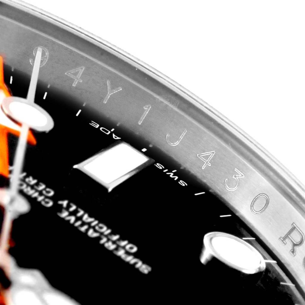 The image shows a close-up angle of a Rolex Explorer 216570 Men's Stainless Steel Black Dial 216570 Men's Stainless Steel Black Dial watch, highlighting part of its dial and serial number on the inner bezel ring.
