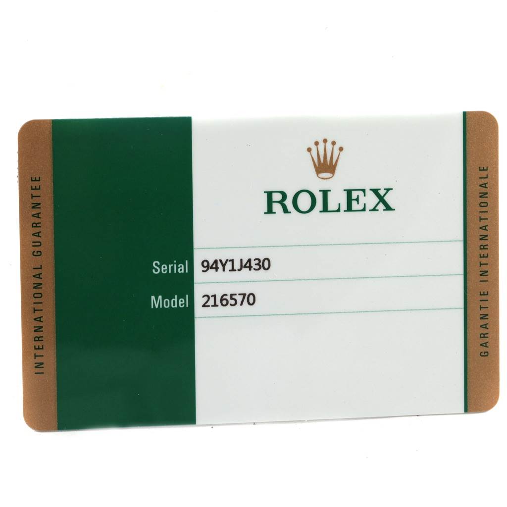 The image shows an international guarantee card for the Rolex Explorer 216570 Men's Stainless Steel Black Dial 216570 Men's Stainless Steel Black Dial model with serial number 94Y1J430 and model number 216570.