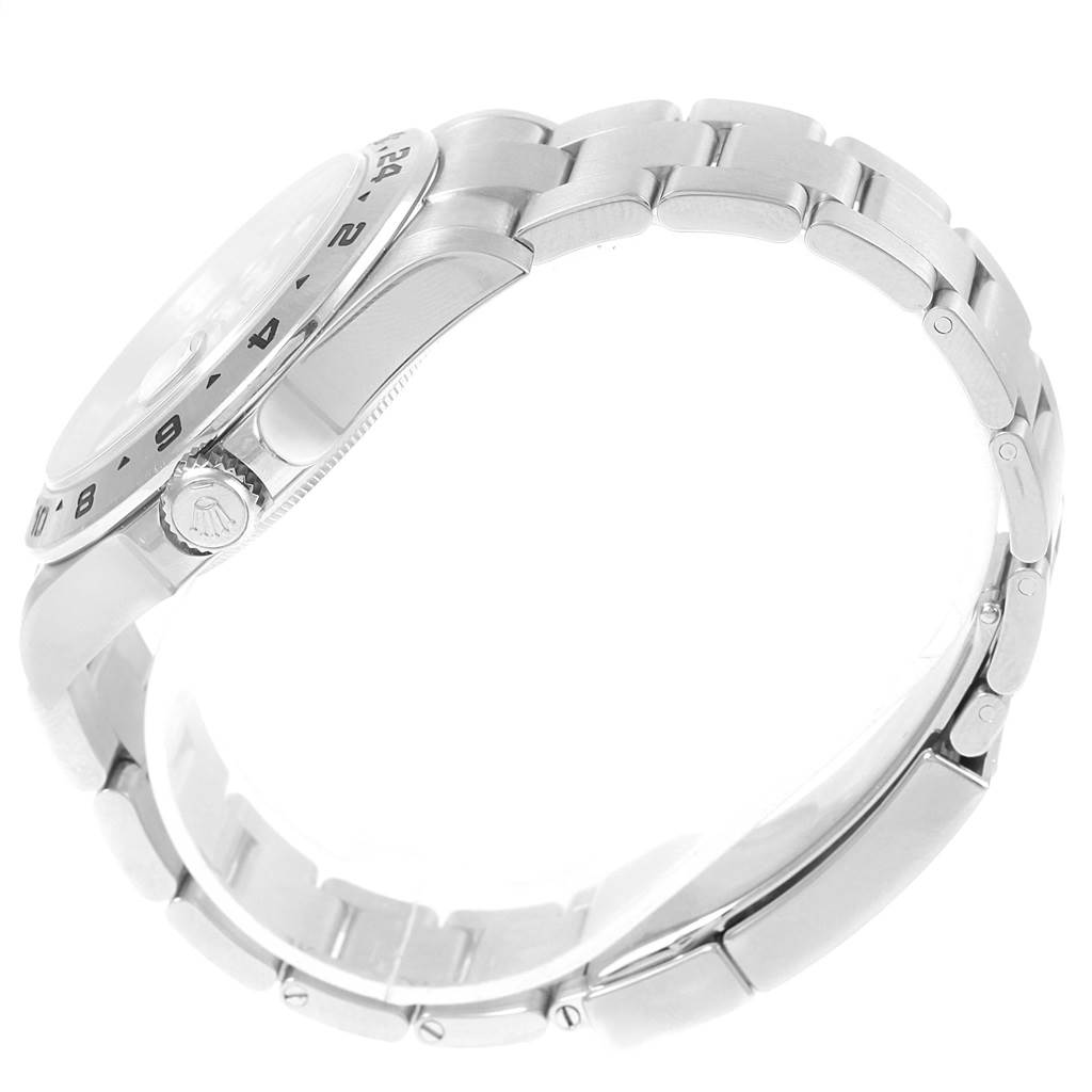 This image shows a side angle of the Rolex Explorer 216570 Men's Stainless Steel Black Dial 216570 Men's Stainless Steel Black Dial watch, highlighting the watch band, bezel, and crown.