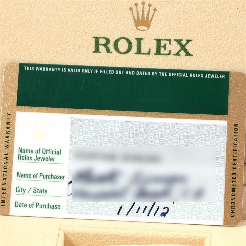 The image shows an international warranty card for the Rolex Explorer 216570 Men's Stainless Steel Black Dial 216570 Men's Stainless Steel Black Dial watch.