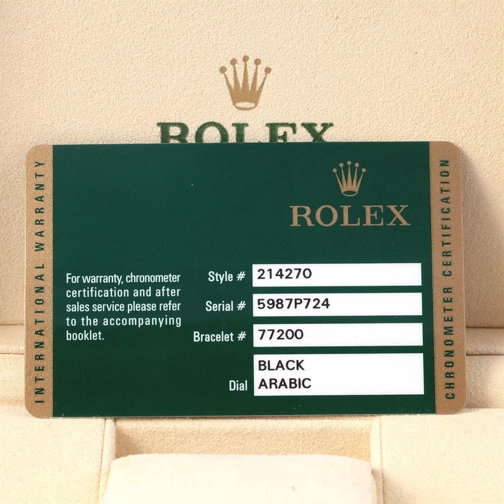 The image shows a warranty card for the Rolex Explorer 214270 Men's Stainless Steel Black Dial 214270 Men's Stainless Steel Black Dial model, detailing the style, serial, bracelet number, and dial information.