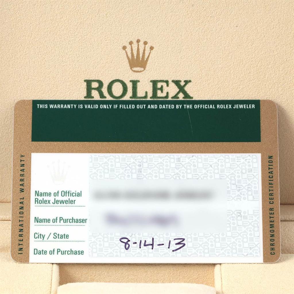 The image shows the international warranty card for a Rolex Explorer 214270 Men's Stainless Steel Black Dial 214270 Men's Stainless Steel Black Dial watch, emphasizing the brand's logo and purchase details.