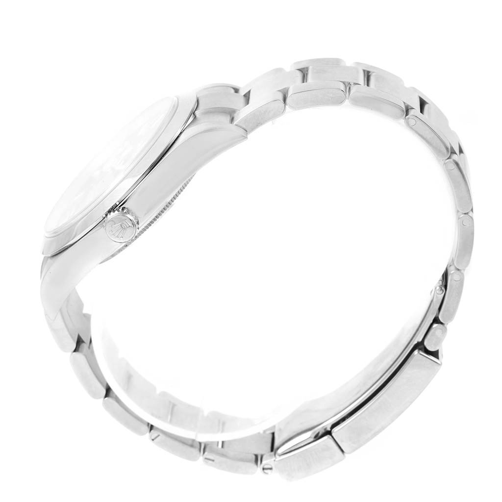 The image shows a side profile of a Rolex Explorer 214270 Men's Stainless Steel Black Dial 214270 Men's Stainless Steel Black Dial watch, highlighting its band, bezel, and crown.