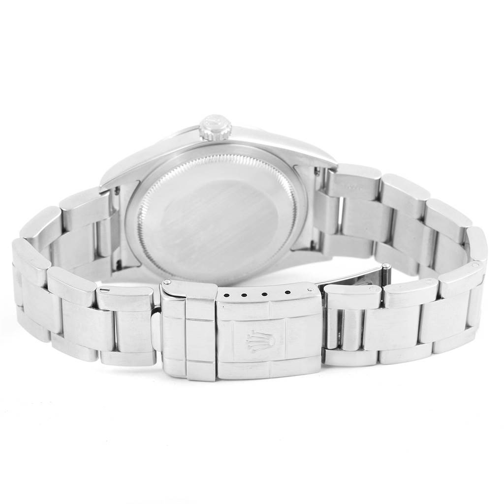 The Rolex Explorer 114270 Men's Stainless Steel Black Dial 114270 Men's Stainless Steel Black Dial watch is shown from the back, displaying the bracelet, clasp, and case back.