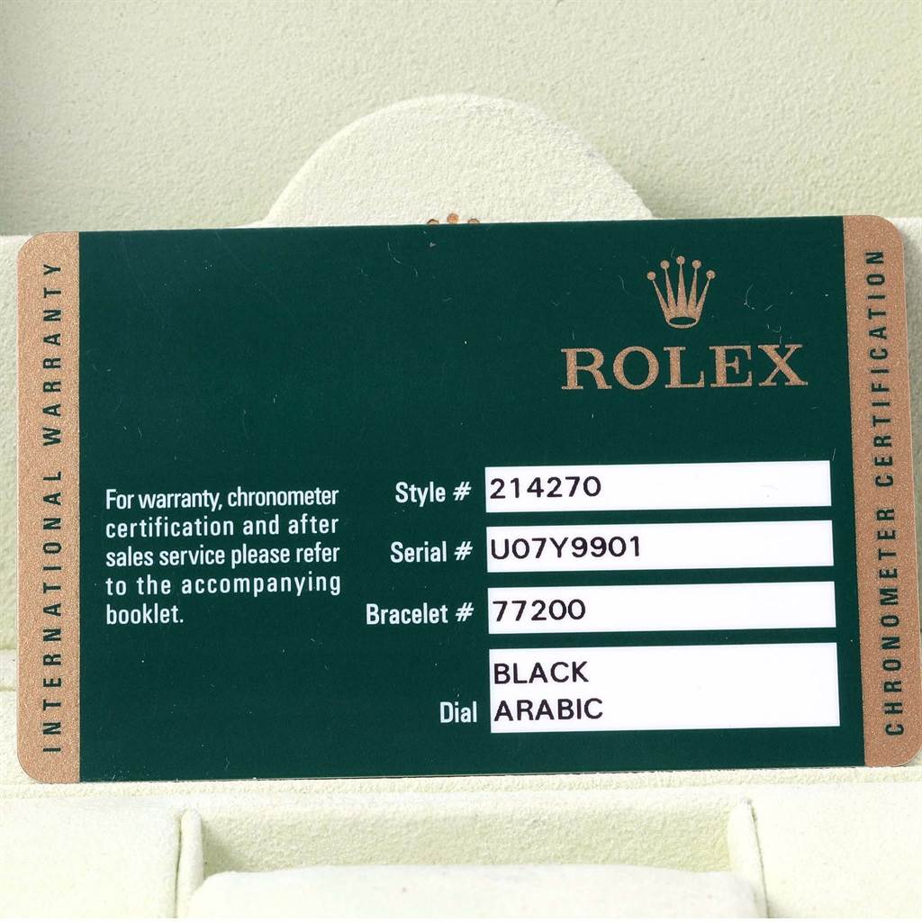 The image shows an International Warranty card for a Rolex Explorer 214270 Men's Stainless Steel Black Dial 214270 Men's Stainless Steel Black Dial model, detailing style, serial, bracelet number, and dial information.